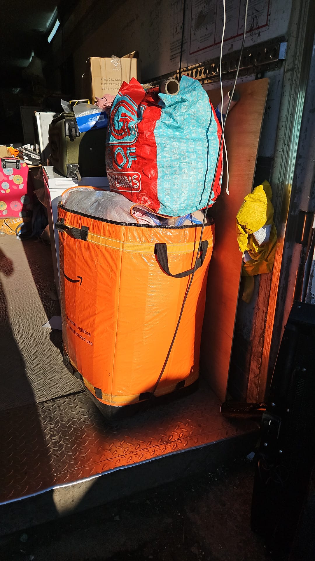 Household items packed in reusable shipping bags
